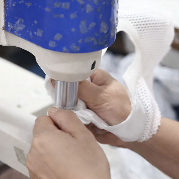 Packing line preparing barefoot shoes for export shipment